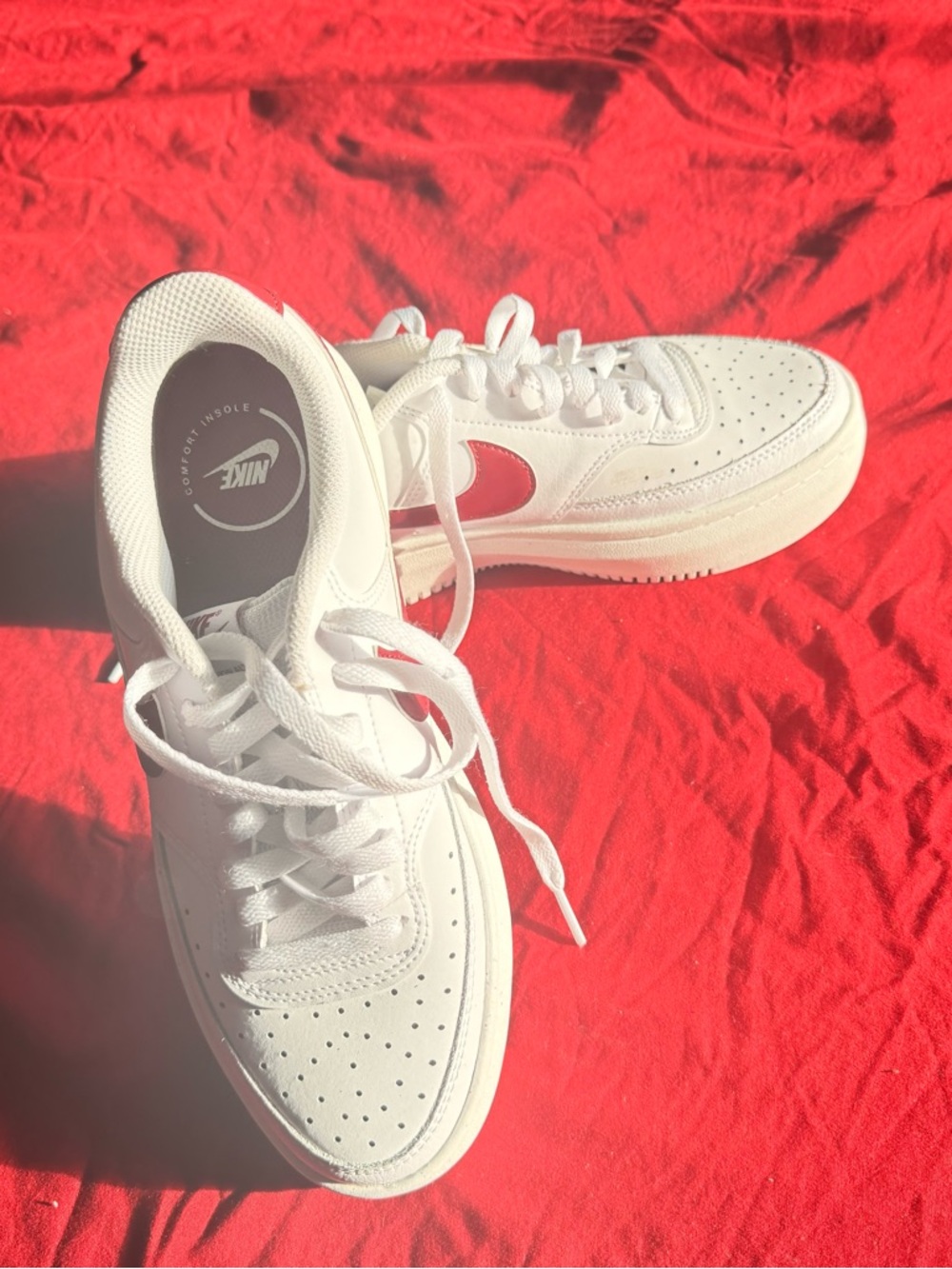 Nike White Low-Top Sneakers with Red Swoosh